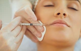 Experience the lip filler process at Columbine Aesthetics. From consultation to aftercare, achieve beautiful, natural-looking results. Call (720) 504-4407 to schedule your consultation and enhance your lips with expert care.