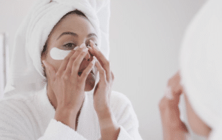 receiving a microneedling session to improve skincare product absorption at Columbine Aesthetics. Call (720) 504-4407 to schedule your microneedling appointment and boost your skincare results.