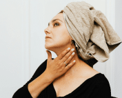 Woman receiving Botox treatment for neck wrinkles at Columbine Aesthetics—call 720-504-4407 to smooth tech neck lines and neck bands safely and effectively.