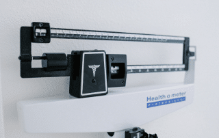 Patient receiving guidance during their first Semaglutide weight loss appointment at Columbine Aesthetics — call 720-504-4407 to begin your safe and supported journey to better health.