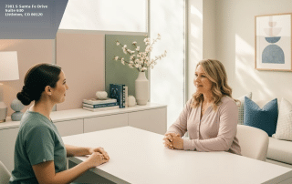 First medspa consultation at Columbine Aesthetics in Littleton CO — provider reviewing patient goals before injectable treatment